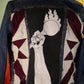 Zeta jacket with hand quilted patches